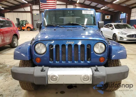 2010 Jeep Wrangler Unlimited Sahara z USA, uszkodzony, nr VIN 1J4BA5H12AL140495